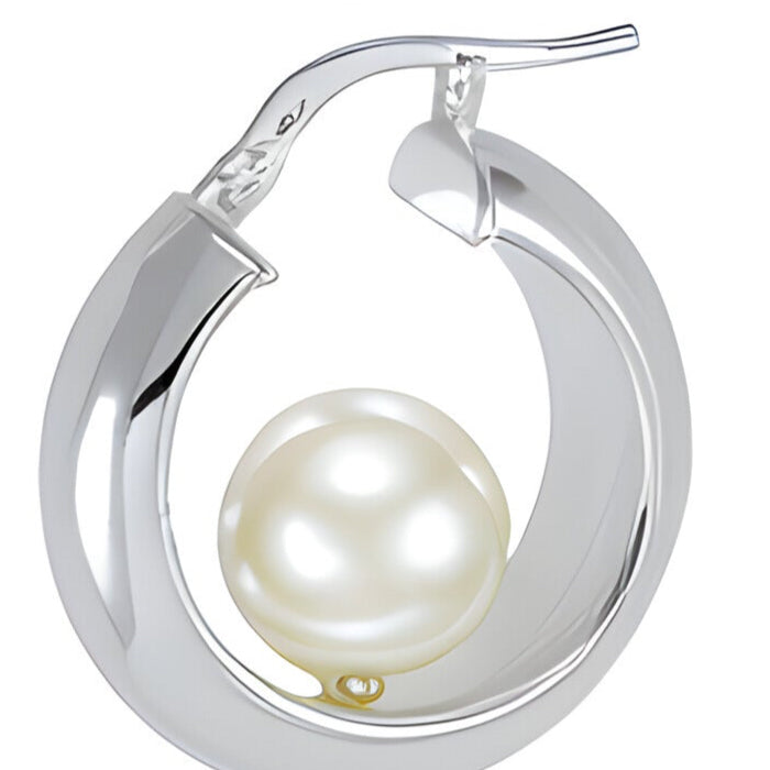 Silver hoop earrings with pearl on a white background