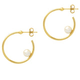 Gold hoop earrings with pearls