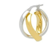 Gold and silver hoop earrings on a white background