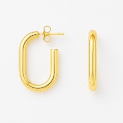 Gold hoop earrings on a white background